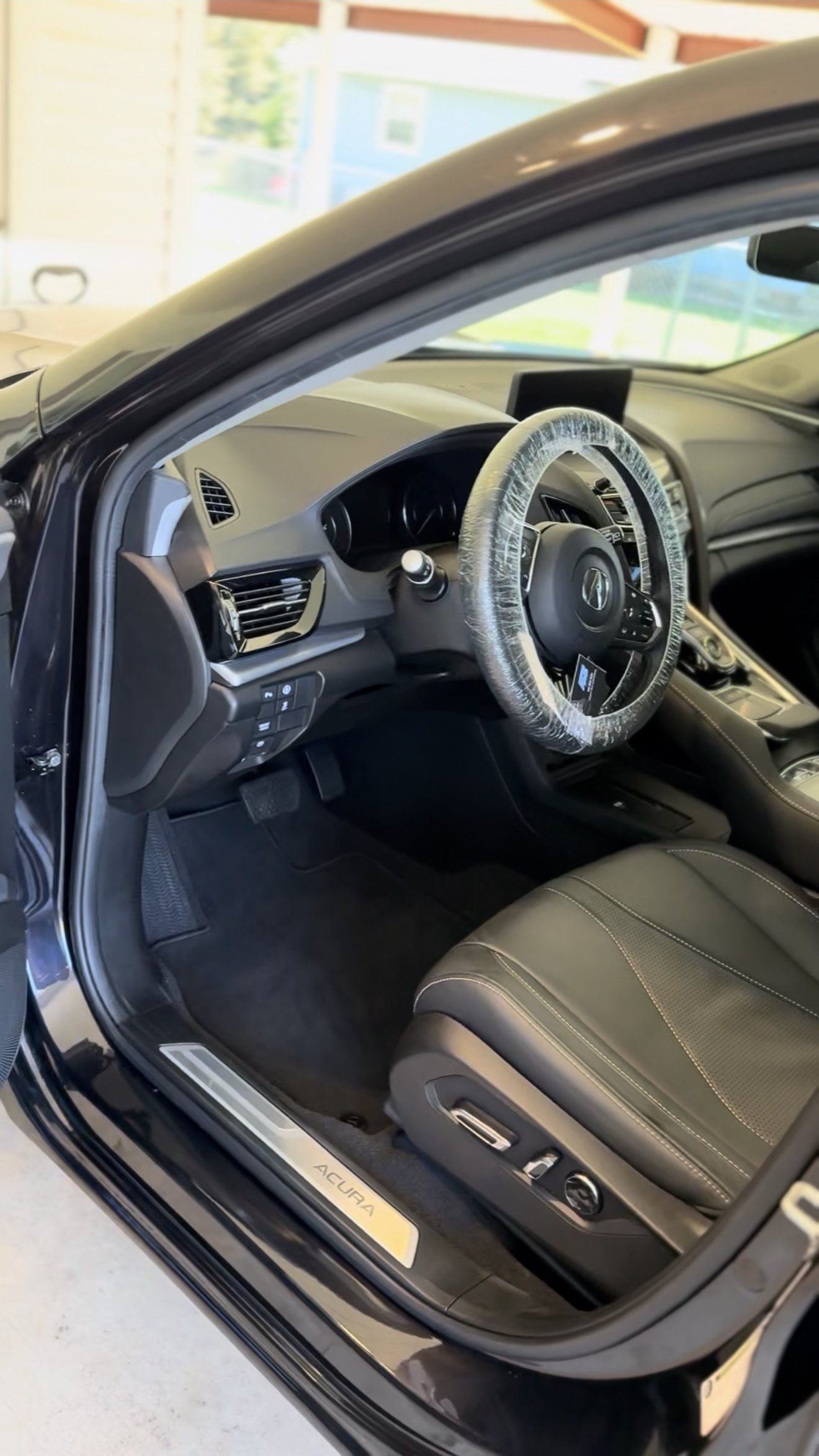 Acura interior — dash, seats and floor mats fully cleaned